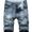 Jeans grigi strappati uomo